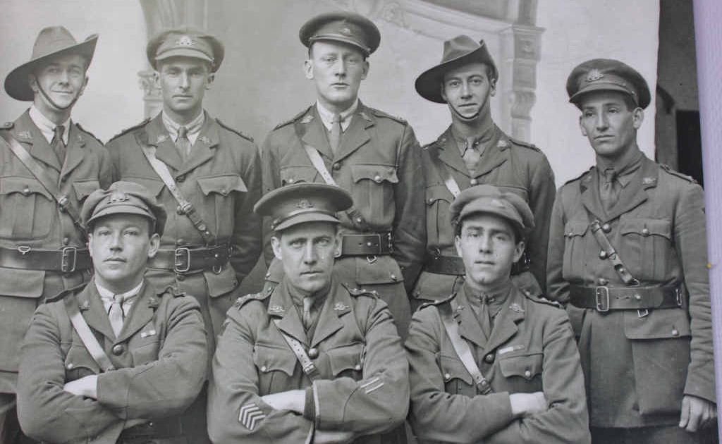 Lieutenant John Doyle from Warwick and a group of soldiers passing through a village. Lieutenant John Doyle from Warwick and a group of soldiers passing through a village.